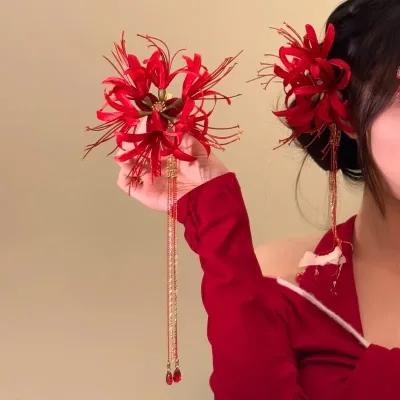 Pince à cheveux fleur rouge à pompon